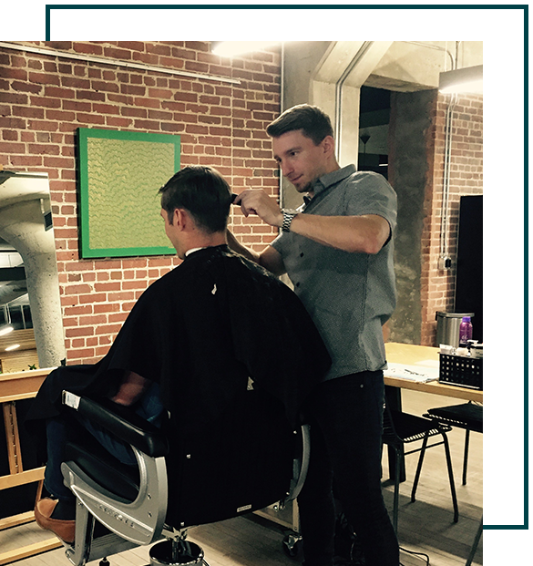 Barber working on client's hair